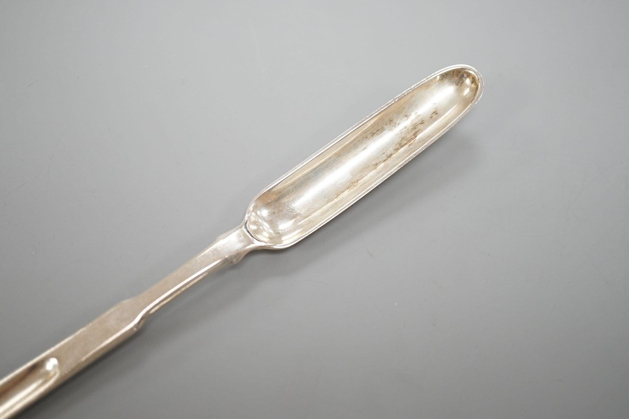 A George III silver marrow scoop, with engraved crest, Peter & William Bateman, London, 1810, 24.6cm, 56 grams.